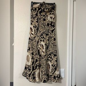 Beautiful 100% silk halter neck printed dress. Black, tan and cream color.